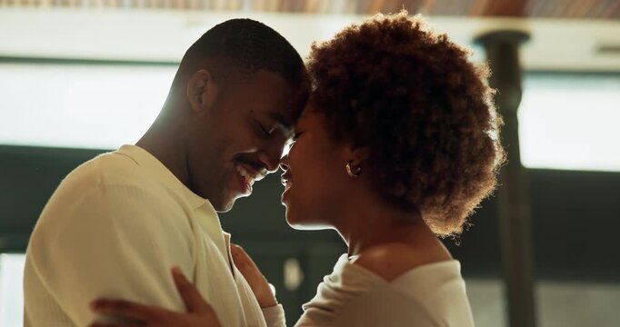 Dance, moment or love with black couple in kitchen of home together for bonding or security. Affection, conversation and forehead touch with happy people in apartment for connection, morning or trust