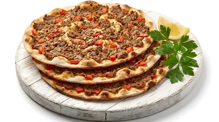 Thin and crispy Armenian Lahmadjo with minced lamb and spices, on a board, isolated on white © Gabby Putri