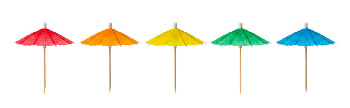 Five colorful paper cocktail umbrellas isolated on transparent background