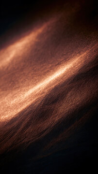 glowing copper and orange light streaks flowing across dark grainy backdrop