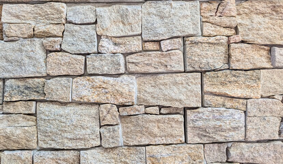 Rough stone wall texture, natural grey rock background © Charlotte