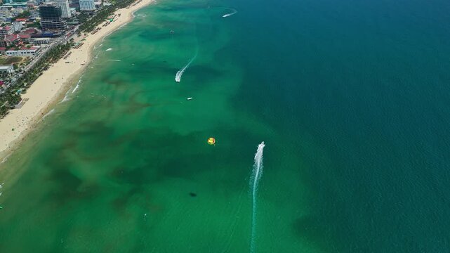 Parasailing In Da Nang, Vietnam. - aerial shot