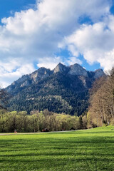 The Trzy Korony summit - one of the most popular tourist destinations in the Pieniny Mountains in Poland as seen from park in Červený Kláštor in Slovakia © AFilipczuk