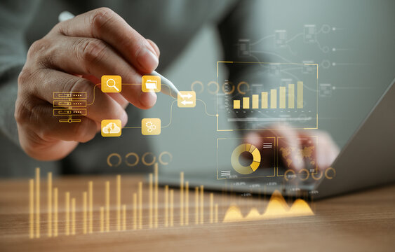 Business professional analyzing AI-powered data dashboards with connected analytics, visualization, and automated insights to improve decision making, operational efficiency, and business performance.