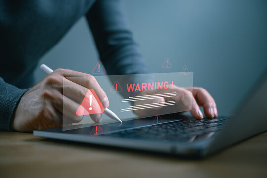 Digital warning notification displayed on a business system highlighting cybersecurity threats, risk detection, and data protection to strengthen enterprise security, monitoring, incident response.