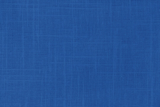 Dark blue linen fabric cloth texture for background, natural textile pattern.