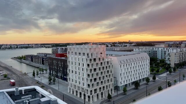 4K Video of Beautiful Orange 10 PM Sunset Balcony View Over J&auml;tk&auml;saari Helsinki