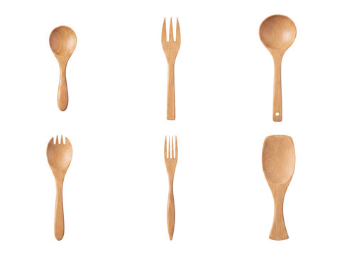 Overhead studio photograph presenting a complete set of assorted wooden kitchen utensils, including spoons and forks.