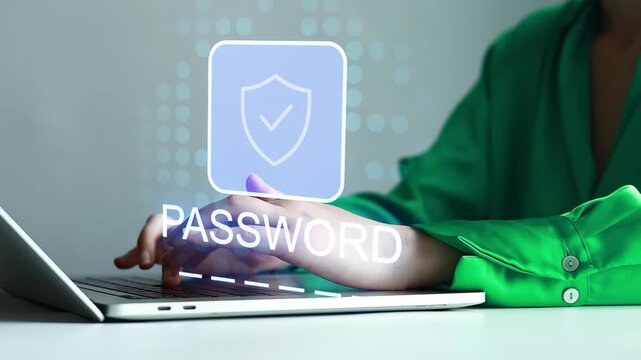 Focus on password security while using a laptop in a modern workspace during daytime hours.