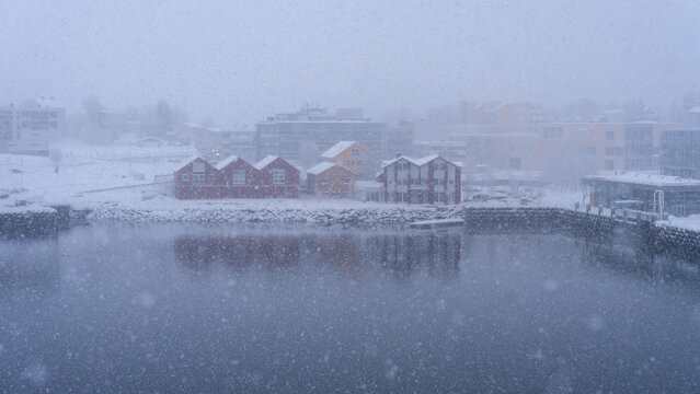 Snow covered Finnsnes harbor terminal in Troms, Norway