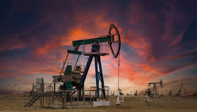 An oil pump pumps crude oil in the steppes of Kazakhstan near the city of Aktau.