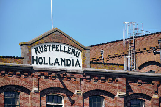 Wormer, Netherlands - 08 May 2026: View of the historic Rijstpellerij Hollandia industrial heritage facade, a testament to the food processing industry along the Zaan river.