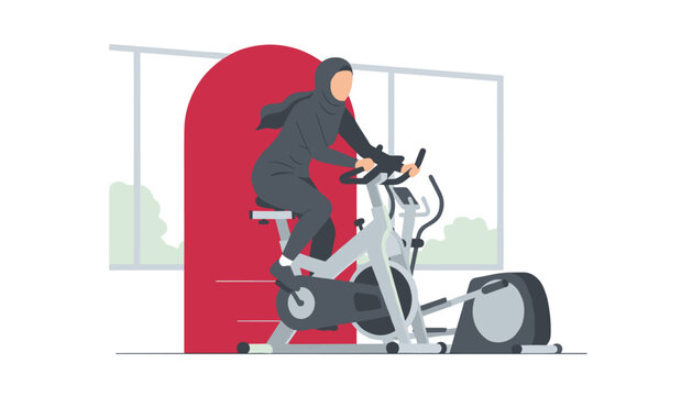 Muslim woman wearing a hijab cycling on an indoor exercise bike during a fitness workout session in a bright and airy gym environment.