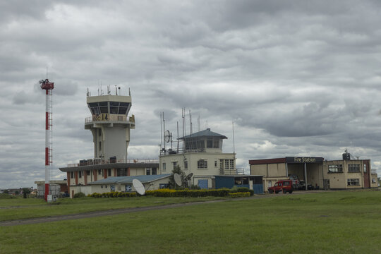Nairobi, Kenya - 31 May 2026: View of the Wilson Airport control tower and fire station building under a cloudy sky.
