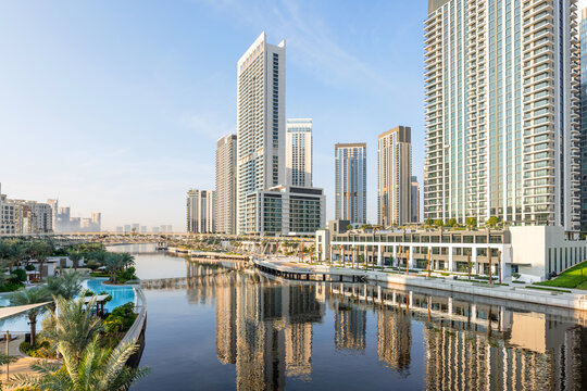 Scenic waterfront view at Dubai Creek Harbour with modern skyline, promenades and landscaped public areas attracting visitors and residents