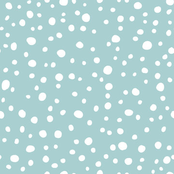 Vector seamless pattern with hand drawn polka dots. Cute design for textile, backgrounds, wallpaper, wrapping paper, digital prints.