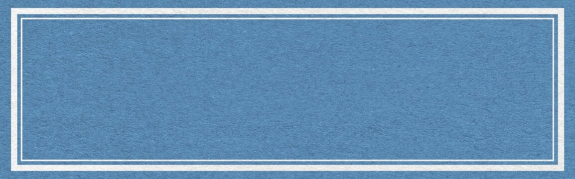 Steel blue textured paper background with white double frame border and copy space for website header banner template