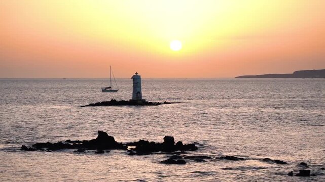 Mangiabarche Lighthouse, Sant Antioco, Sardinia, Italy. Sunset