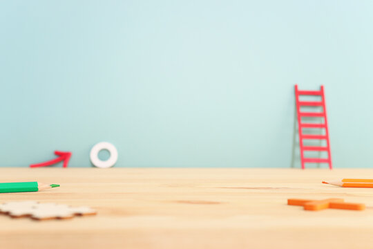 Wooden table and blue pastel background
