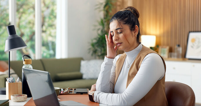Headache, stress and businesswoman in home with laptop for legal research with freelance career. Remote work, migraine and female paralegal with brain fog for law case on computer in apartment.