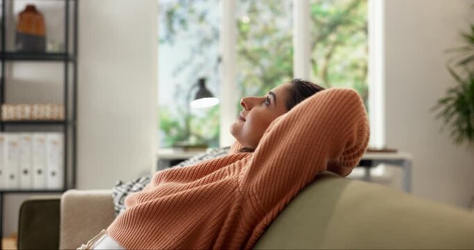 Calm, stretching and woman relax on sofa in home, thinking and resting with wellness in living room. Couch, break or person with comfort at apartment, self care or vision for peace with stress relief