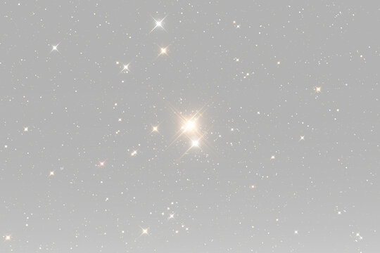 Golden festive star particles glowing with luxury sparkle and celestial magical brilliance