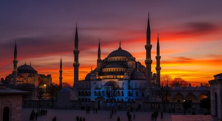 Fototapeta premium Majestic mosque architecture illuminated against dramatic twilight sky