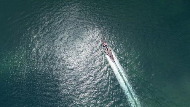 Paddle steamer out at sea.