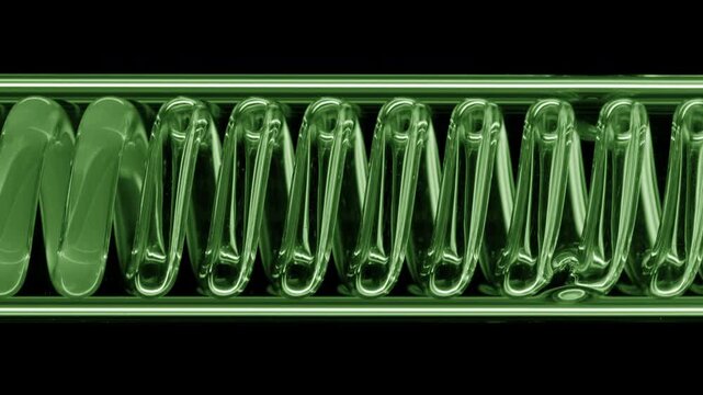 Prominent close shot of green translucent liquid flowing through a horizontally mounted coil laboratory condenser standing against black