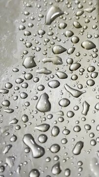 Reflective Chrome and Crystalline Water Droplets: A Study in Texture