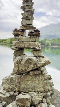 Zen Stones Esthetic by the Lake in a Lush Spring Forest