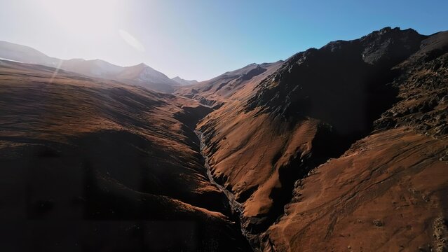 Mountain landscape with colorful hills and blue sky