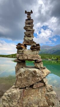 Calming Nature Aesthetics: Zen Stones, Water Reflections, and Spring Trees