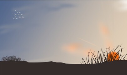 Landscape views overlooking sunrise or sunset. © Wildan