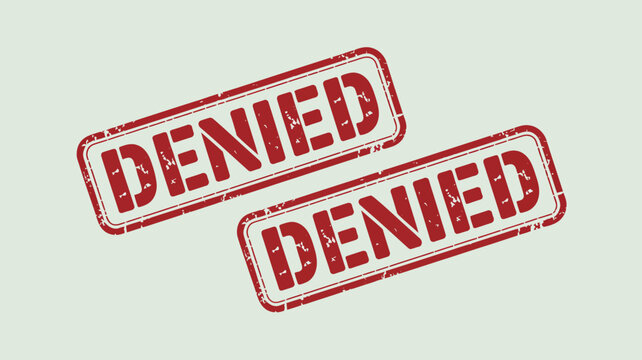 Two red rubber stamped denial signs with a distressed texture on a light green background denied rejection refusal veto disapproved