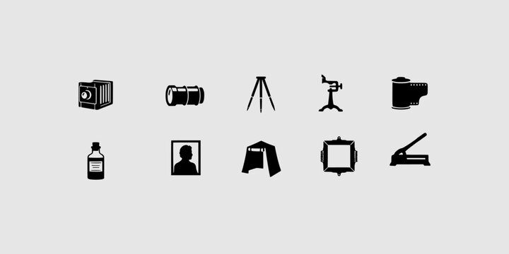 Icon set collection of classic photography equipment including antique cameras, lenses, tripod, film reels, and vintage darkroom chemical development tools