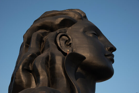 Peaceful Shiva statue under clear blue sky in Isha yoga Centre, Coimbatore