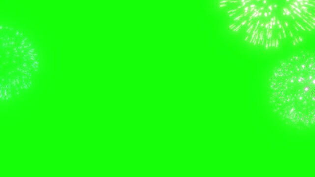 Glowing fireworks exploding on green screen with heart shapes