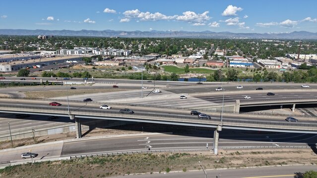 View of S Santa Dr Highways with rocky mountains in background on a clear sunny day in Colorado
