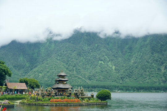Ulun Danu Beratan Temple on Lake with Misty Mountains in Bali Indonesia