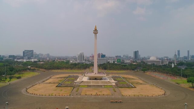 Aerial drone view of the Monas (Monumen Nasional / National Monument) in Merdeka Square, Central Jakarta, Indonesia.