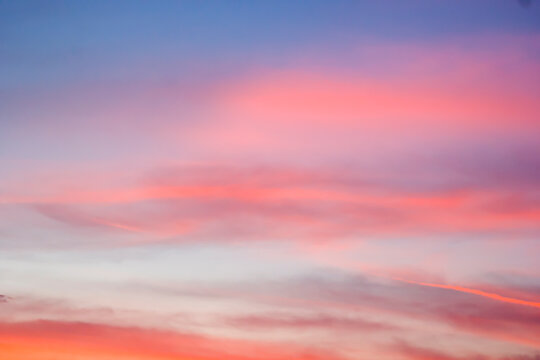 Soft Sunset Sky with Orange and Purple Gradient Clouds