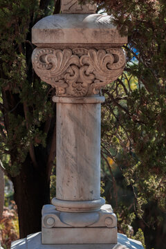 Elements of architectural decorations of buildings, columns and tops, gypsum molding, wall texture and stucco patterns. On the streets in Barcelona, public places.
