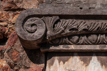 elements of architectural decorations of buildings, ancient arches and columns, pommel and patterns, on the streets in Barcelona, public places. © Kozlik_mozlik