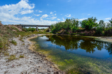 Fototapeta premium Bridge on Salado River or Chadileuvu River, La Reforma city, La Pampa Province, Argentina