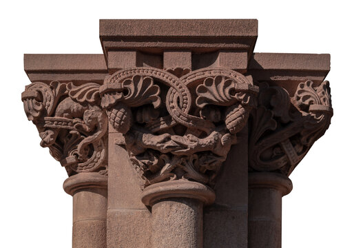 elements of architectural decorations of buildings, ancient arches and columns, pommel and patterns, on the streets in Barcelona, public places.