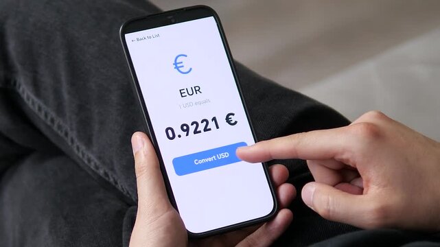 User reviewing the Euro rate before a trip. The clean screen displays the current value for seamless travel budgeting. Great for travel finance, currency exchange apps, and lifestyle planning content.