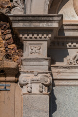 Elements of architectural decoration of buildings, columns, patterns and stucco molding. On the streets in Barcelona, ​​public places. © Kozlik_mozlik
