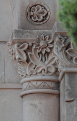 elements of architectural decorations of buildings, ancient arches and columns, pommel and patterns, on the streets in Barcelona, public places. © Kozlik_mozlik