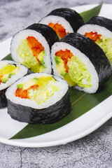 sushi on a white plate © 0990930308